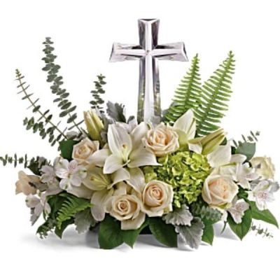 <div id="mark-3" class="m-pdp-tabs-marketing-description">This reverant bouquet of serene white flowers is a beautiful sharing of sympathy, adorned with a majestic crystal cross keepsake.</div>
<div id="desc-3">
<ul>
 	<li>Green hydrangea, crème roses, white asiatic lilies, and white alstroemeria are accented with dusty miller, sword fern, spiral eucalyptus, and lemon leaf.</li>
</ul>
</div>