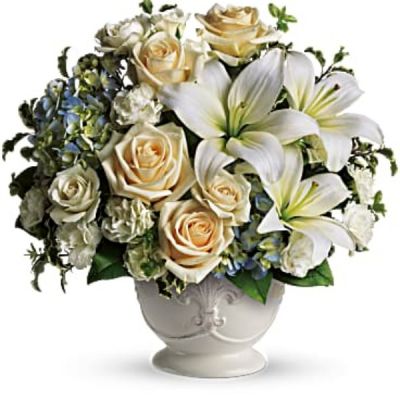 <div id="mark-2" class="m-pdp-tabs-marketing-description">This French country style sympathy arrangement communicates your condolences in a most heartfelt way. It's a lovely choice when you want to send flowers to family or friends.</div>
 
<div id="desc-2">
<ul>
 	<li>A beautiful bouquet of blue and white sympathy flowers - blue hydrangeas, crème roses, white miniature carnations, fragrant white asiatic lilies and green pitta negra - are delivered in a French Country Pot.</li>
</ul>
</div>