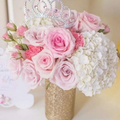 A bouquet designed for that special princess in your life. Appropriate for all ages and comes with a keepsake tiara. Filled to the brim with white hydrangeas, pink roses and pink carnations.