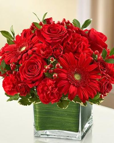 <p>A symbol of courage and strength, an all-red bouquet conveys your sympathies with striking beauty. Our florists fill a stylish cube vase with roses, spray roses, Gerberas, carnations and more to send a fitting tribute during times of sorrow.</p>