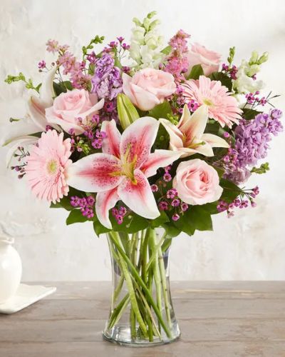 When it comes to letting her know she’s always on your mind, think pink and lavender. We’ve hand-gathered a romantic mix of pink and purple blooms to create a gorgeous, garden-inspired bouquet. Designed by expert florist Breanna Cartwright of Modesto, CA, this beautiful bunch will remain a fond memory for a long time.