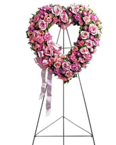 <div id="mark-1" class="m-pdp-tabs-marketing-description">In the shape of a heart, and accented with a pink satin ribbon, this garden of delicate blooms is a tender and classic tribute to a precious life, and a cherished expression of love and sympathy.</div>
<div id="desc-1">
<ul>
<li>Beautiful flowers such as light pink roses, hydrangea and miniature carnations mix with lavender chrysanthemums on an open heart-shaped wreath.</li>
</ul>
</div>