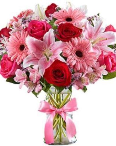 <p>Inspired by the rich beauty of the European countryside, our romantic bouquet reveals all the feelings you have in your heart. Fresh-picked pink & red blooms are on display inside a glass vase finished with ribbon, creating a timeless gift for someone you love.</p>