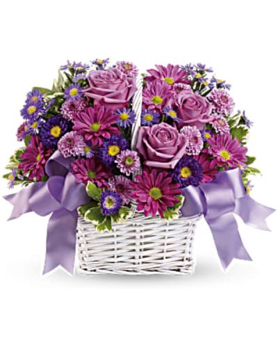 <div class="m-pdp-tabs-description">
<div id="mark-1" class="m-pdp-tabs-marketing-description">Get a handle on spring with this delightful array of floral favorites in a charming white bamboo basket accented with lavender ribbon. Surprise someone who could use a lift. It will make you both happy.</div>
</div>
<p>&nbsp;</p>
<ul>
<li>The cheerful bouquet includes lavender daisy spray chrysanthemums, dark purple asters, lavender cushion spray chrysanthemums and purple asters accented with fresh greenery.</li>
<li>The flowers are delivered in a white bamboo basket accented with a lavender gingham ribbon.</li>
</ul>
<p>&nbsp;</p>