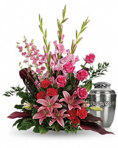 <div class="m-pdp-tabs-description">
<div id="mark-1" class="m-pdp-tabs-marketing-description">Share your heartfelt feelings on the loss of someone special with this feminine arrangement of pink roses, lilies and gladioli. It's a rich reminder of your love at the memorial service.</div>
</div>
<p id="arrngDescp">This feminine arrangement features hot pink roses, pink asiatic lilies, pink gladioli, hot pink carnations, pink larkspur, red ti leaves, Italian ruscus and lemon leaf.</p>
<p>Arrangement does not include urn.</p>