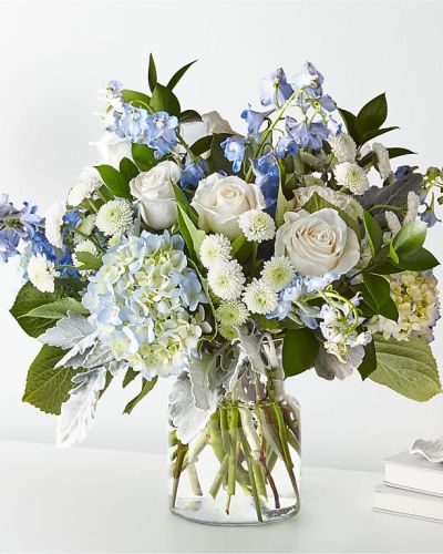<p>Let this uplifting arrangement be reminders of the clear skies ahead. Capturing the feeling of hope that a new day brings, this bouquet is composed of voluminous hydrangea blooms and vibrant belladonna delphinium to refresh their mood.</p>