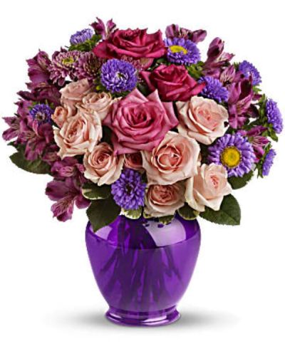 <p>Elegance without extravagance, this magnificent bouquet features a gorgeous blend of pink roses and lavender favorites in a classic ginger jar of translucent purple. The effect is stunning!<br />
The elegant bouquet includes hot pink roses, light pink spray roses, lavender alstroemeria, lavender matsumoto asters and lavender cushion spray chrysanthemums accented with fresh greenery.</p>