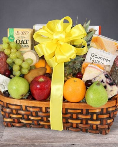 <div id="mark-2" class="m-pdp-tabs-marketing-description">
<hr />
<p style="text-align: right">The gift of good taste! Send this gourmet gift basket of fruit and snacks to a gracious hostess, busy new parents, or anyone who appreciates the finer things in life.</p>
</div>
<div class="m-pdp-tabs-marketing-description" style="text-align: right">This wonderful basket overflows with delicious fruit and tasty treats.</div>
<div id="desc-2">
<ul>
<li style="text-align: right">Apples, pears, oranges, grapes, bananas and a pineapple are presented with cheeses, crackers, tea and other savory snacks in a natural gift basket that's trimmed with a bow.</li>
</ul>
</div>